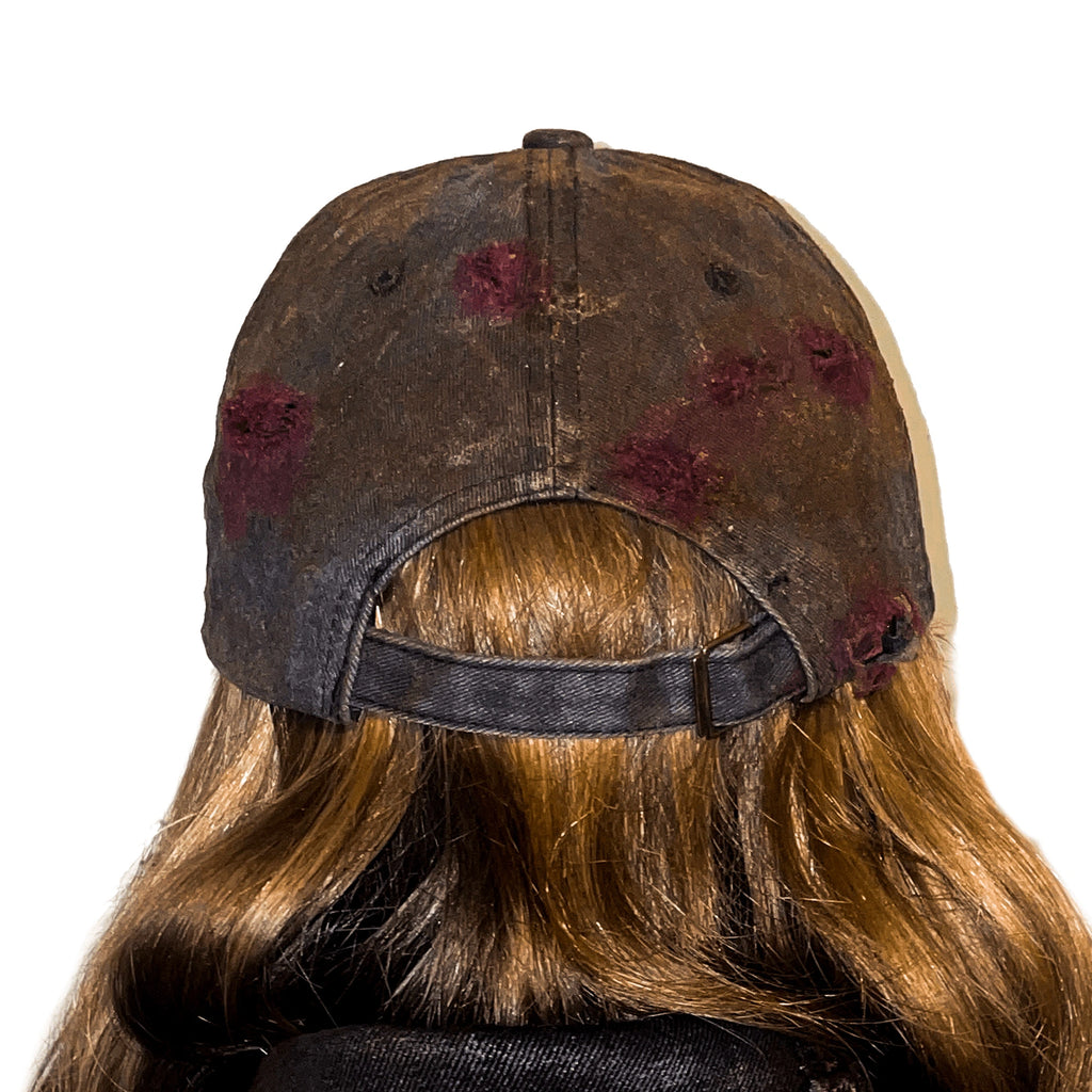 SELF-DECAY DISTRESSED CAP