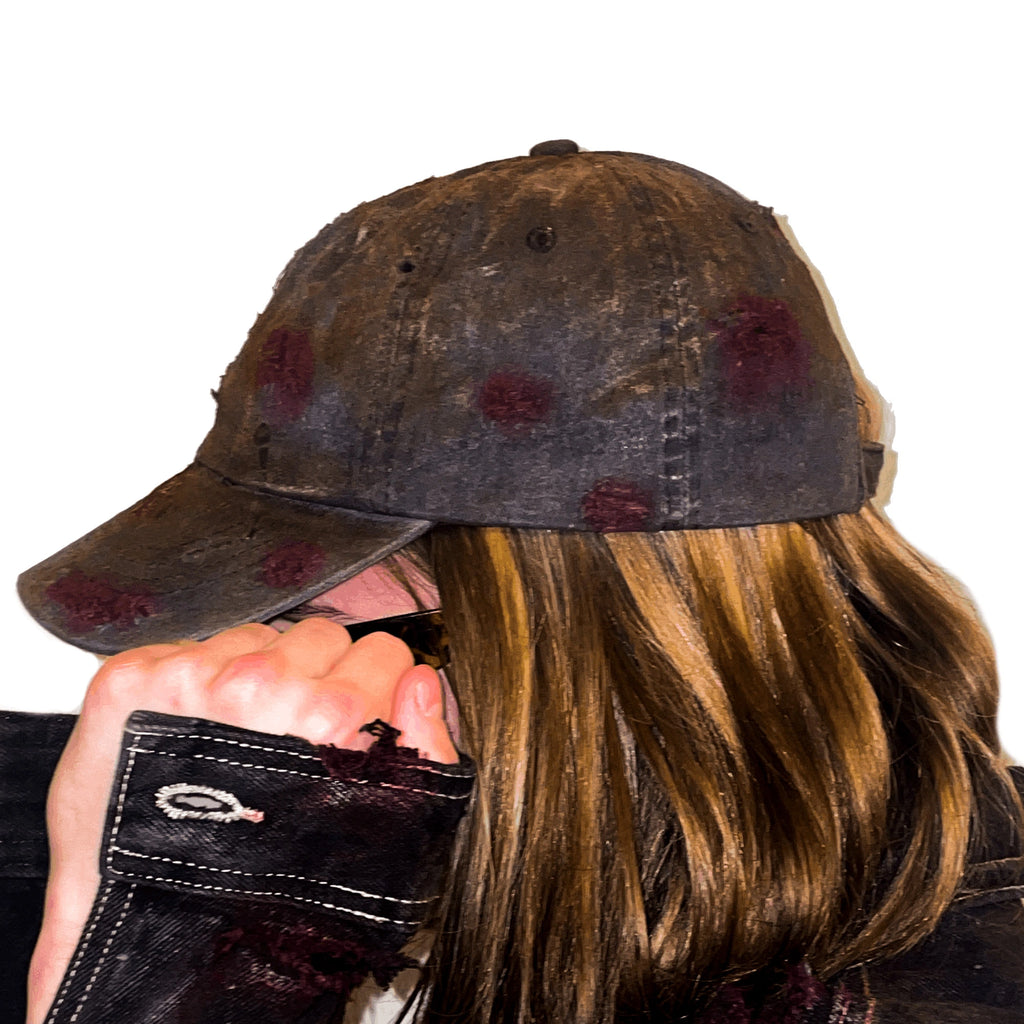 SELF-DECAY DISTRESSED CAP